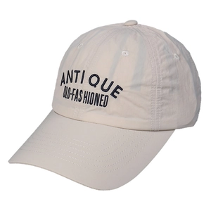Light beige quick-dry nylon baseball cap with black Antique embroidery and curved brim