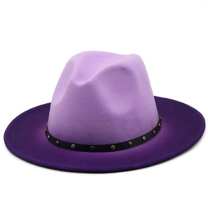 Macro detail of the purple gradient fedora hat with a black studded ribbon band