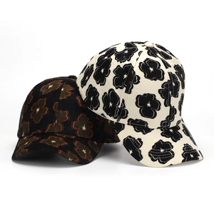 Structured floral print baseball caps in black and cream white for outdoor sun protection
