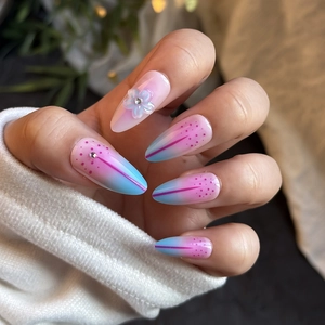 Pink blue gradient almond press-on nails with 3D floral accents and rhinestones