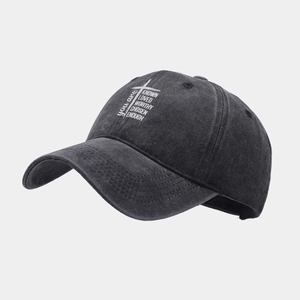 Detail of washed charcoal grey baseball cap with printed cross and inspirational text
