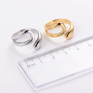 Minimalist infinity spiral rings in gold and silver stainless steel finishes
