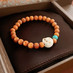 Vintage sandalwood beaded bracelet with acrylic cat paw charm in ethnic style