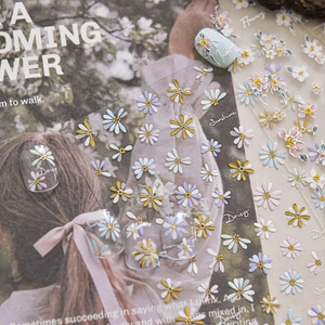 3D embossed daisy nail stickers set with floral macaron petals and gold texture details