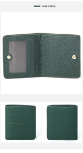 Detail view of dark green leather wallet with RFID blocking slots and snap closure
