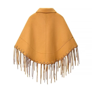 Fashionable mustard yellow faux suede shawl featuring fringe hem detailing, rear view