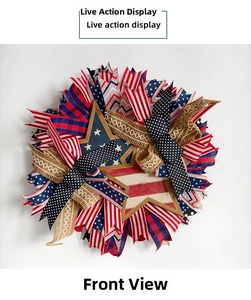 Close-up of patriotic US Independence Day wreath with burlap ribbons and wooden stars