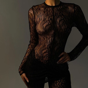 Close-up showing the intricate floral lace texture and sheer mesh of this black bodysuit