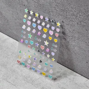 5D embossed nail stickers featuring colorful stars and heart planet designs for nail art