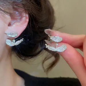 Elegant feather zircon jacket earrings in silver finish featuring layered front-back design