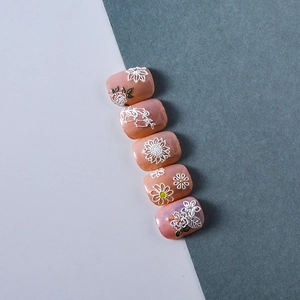 5D embossed nail stickers featuring 3D white floral patterns on translucent pink base