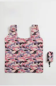 Detail of pink camo foldable shopping bag with a black plastic hook for storage