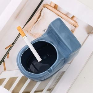 Creative blue toilet-shaped ceramic ashtray for desk with windproof deep basin design