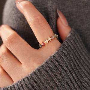 Close-up of 18k gold-plated open ring with colorful zircon floral gemstones on a model