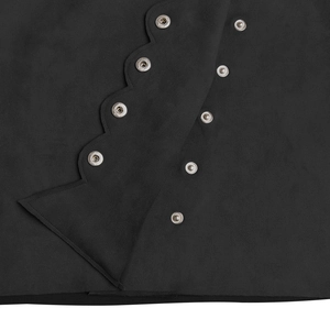 Macro detail of black faux suede mini skirt featuring silver snap buttons and wavy edge