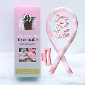 Heatless hair curler set in pink and blue tie-dye satin with clips and packaging