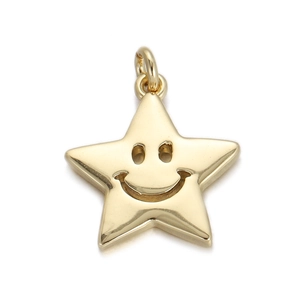 Macro view of 18K gold plated star pendant with a cut-out smile face design detail