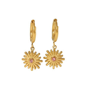 Macro view of 18K gold stainless steel daisy earrings with pink zirconia center