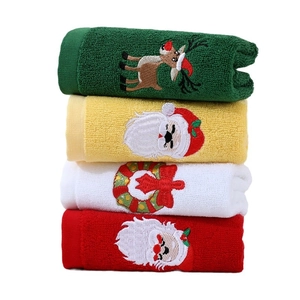Set of 4 Christmas cotton towels with festive reindeer and Santa Claus embroidery patterns