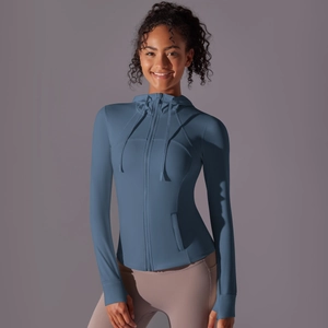 Detailed side view of women's navy blue hooded sports jacket with thumbholes and zip pocket