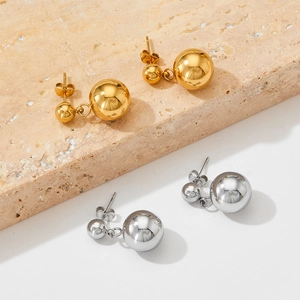 Polished stainless steel double ball drop earrings in gold and silver finishes