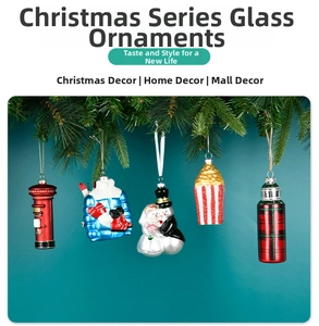 Close-up of hand-painted glass Christmas ornaments including mailbox and snowman styles