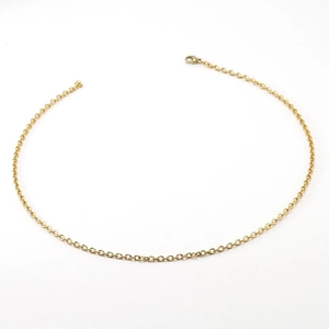 Minimalist golden titanium steel chain necklace with punk style links on white background