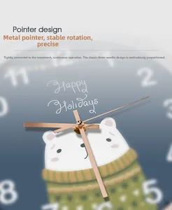Macro detail of golden metal hands and polar bear illustration on 20cm clock face