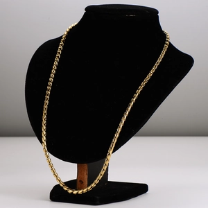 Polished gold stainless steel twist chain necklace displayed on a black neck mannequin