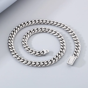 Polished silver stainless steel 12mm Cuban link chain necklace in spiral arrangement