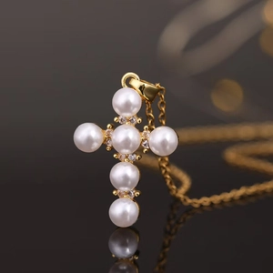 Elegant gold titanium steel cross pendant necklace with white pearls and zircons