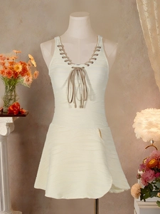 Elegant cream one-piece swimsuit with V-neck cross-lace design and textured fabric