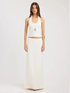 Chic cream white knitted two-piece set featuring halter neck top and long maxi skirt