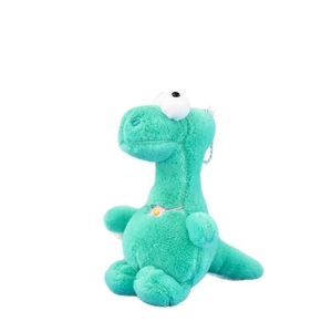 Cute green plush dinosaur keychain with big bulging eyes and a small pink flower necklace