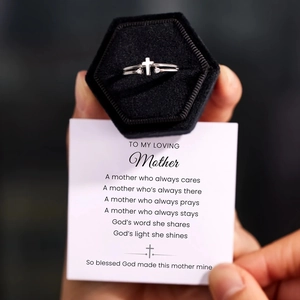 Silver cross ring with cubic zirconia in a velvet box with a mother's day card