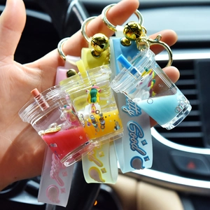 Handheld liquid glitter unicorn cup keychain with silicone wristlet and golden bell