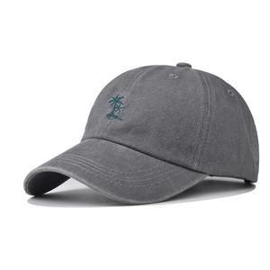 Washed dark gray baseball cap featuring green palm tree embroidery and retro cotton finish