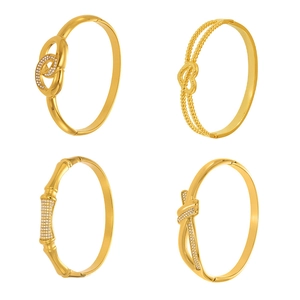 Set of four 18k gold-plated stainless steel geometric bangles with crystal inlay and knots