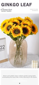 Artificial sunflowers in a crackle glass vase on white lace cloth for home decor
