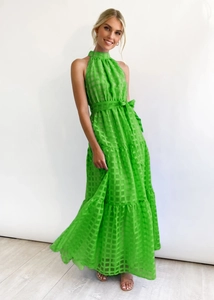 Detail of green plaid halter maxi dress with waist belt and layered tiered skirt