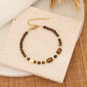 Tiger eye stone necklace with gold heart pendant and stainless steel beads on stone