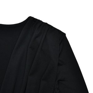 Detail shot of black deep V-neck bodysuit showing pleated shoulder design and knit texture