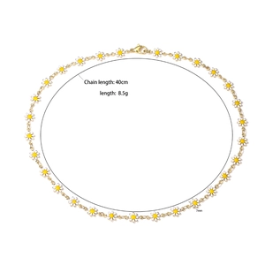 Daisy enamel gold chain necklace with white petals and yellow centers, 40cm length