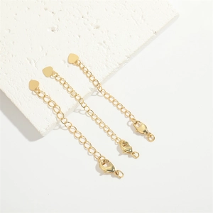 Three-piece gold extension chain set with heart pendants and lobster clasps for jewelry