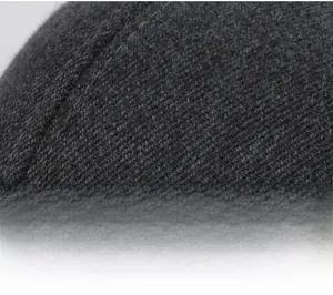 Detailed macro view of dark grey thick wool knit fabric for winter earflaps hat