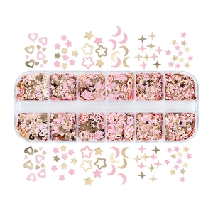 Detail of 12-grid box with pink and gold butterfly heart nail art sequins for DIY