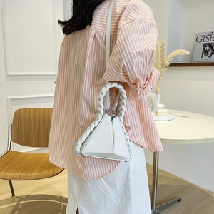 White geometric triangle handbag with braided twist handle and adjustable shoulder strap