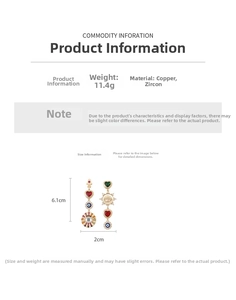Detail of asymmetrical long earrings with cubic zirconia and bohemian mystical charms