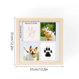 Detail of square pet paw print memorial frame showing photo slots and ink pad sections