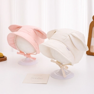 Soft infant corduroy warm hat with cute bunny ears and chin straps in pink and cream colors